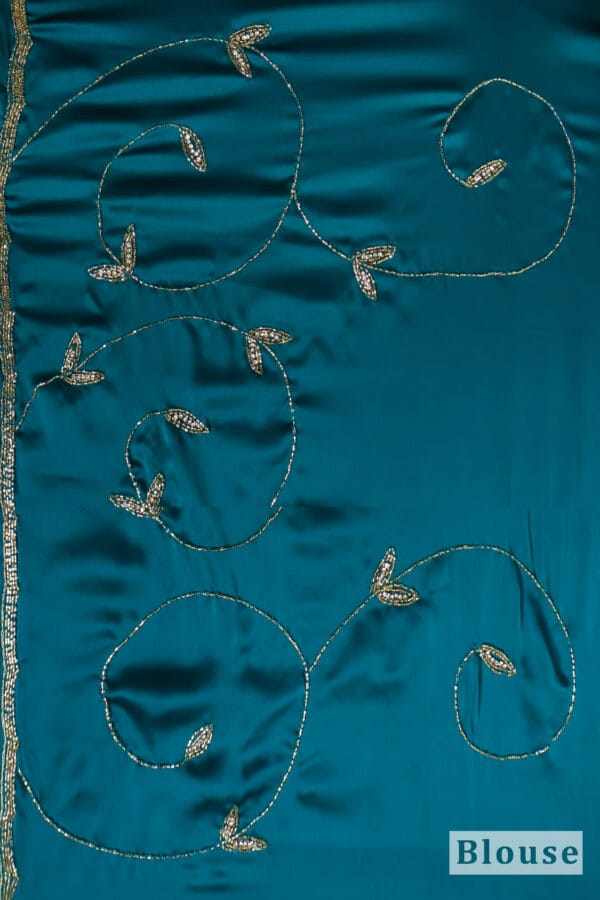 Teal Silk Saree with Silver Detailing